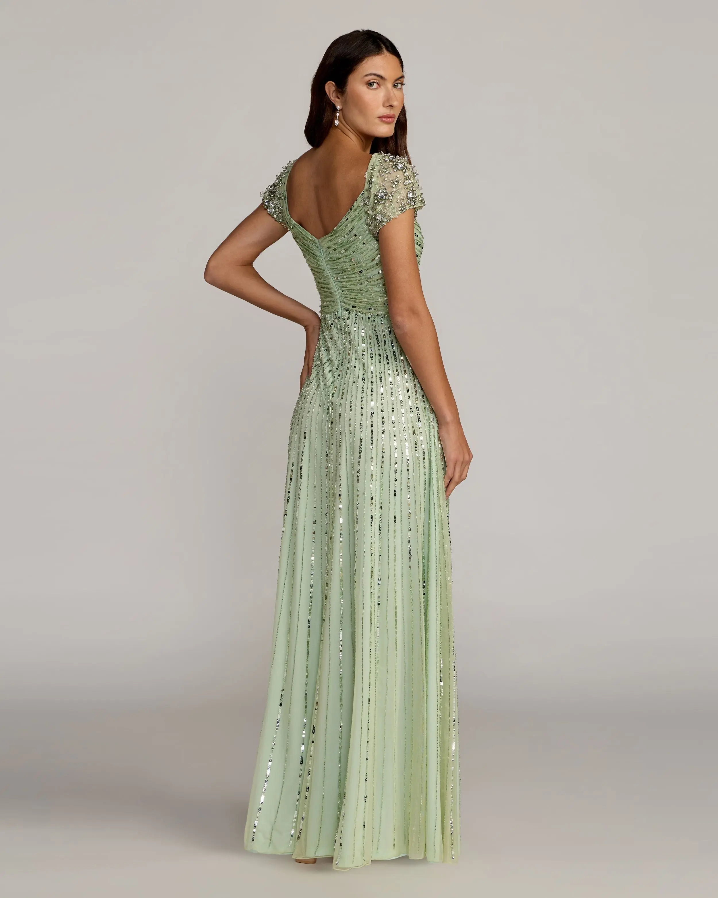 Green Sequined Evening Gown With Embellished Shoulders - Image 3